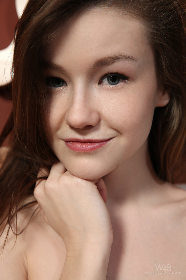 'Busty Brunette Teen Emily in Orange Body Dress for Watch4Beauty' with Emily Bloom via Watch4Beauty - Pic #12