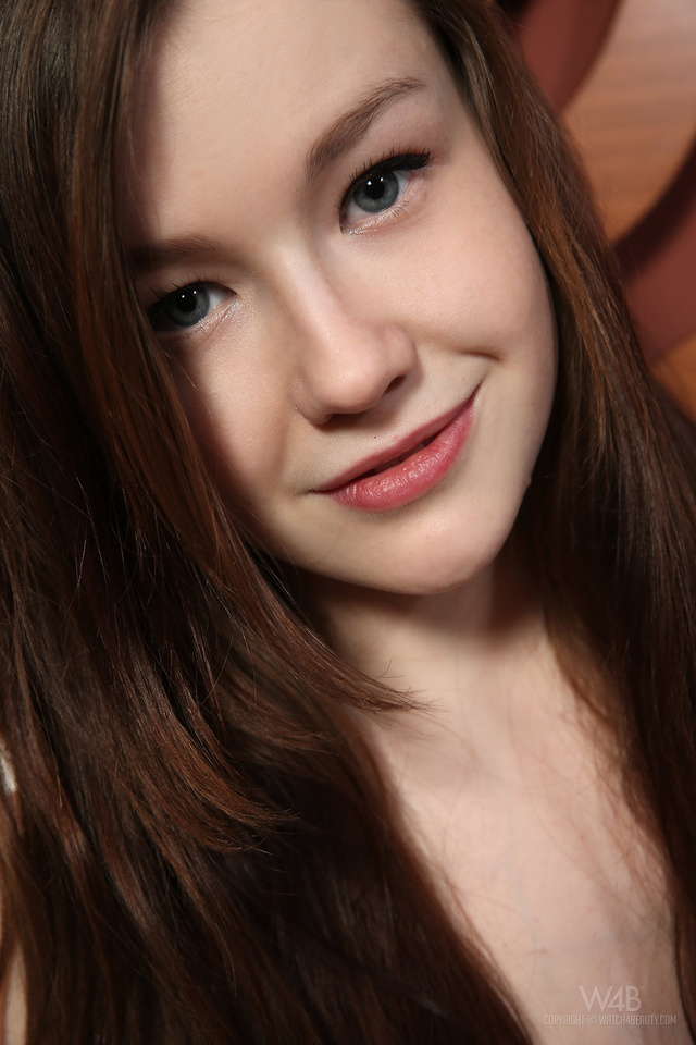 'Busty Brunette Teen Emily in Orange Body Dress for Watch4Beauty' with Emily Bloom via Watch4Beauty - Pic #15